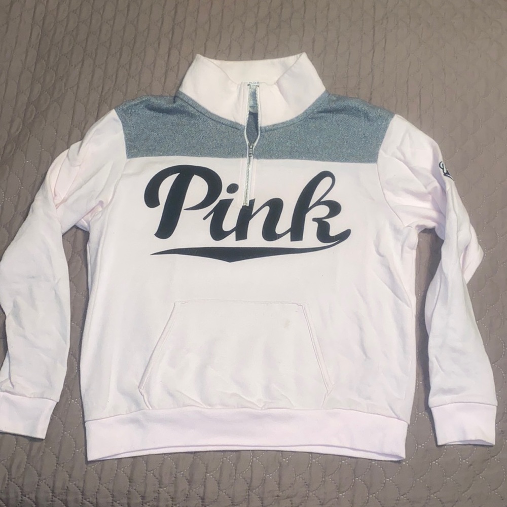 PINK 3/4 zip with front pocket. Pale pink color.